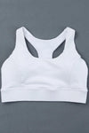 a white sports bra top on a gray background