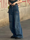 Multi-pocketed, zipped, distressed jeans with a straight leg and wide leg