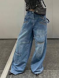 Multi-pocketed, zipped, distressed jeans with a straight leg and wide leg