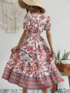 All-over positioning print printed puff-sleeved maxi-neck dress