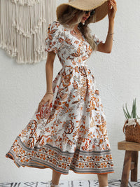 All-over positioning print printed puff-sleeved maxi-neck dress