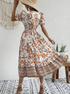 All-over positioning print printed puff-sleeved maxi-neck dress