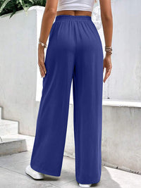 New women's mid-waist straight pants, loose sports solid color pocket casual trousers